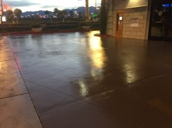 High Gloss concrete Sealer is applied after a rich brown concrete Stain color is applied to the concrete Driveway. Extensive concrete cleaning with a Clark aggressive concrete scrubber with acid degreaser followed with a Pressure wash for proper wash down 