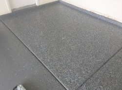 Garage Floor Epoxy Coating-Adding the Color Chips